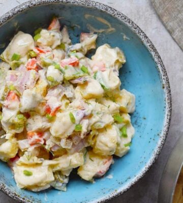 A bowl of healthy creamy vegan potato salad by ElaVegan