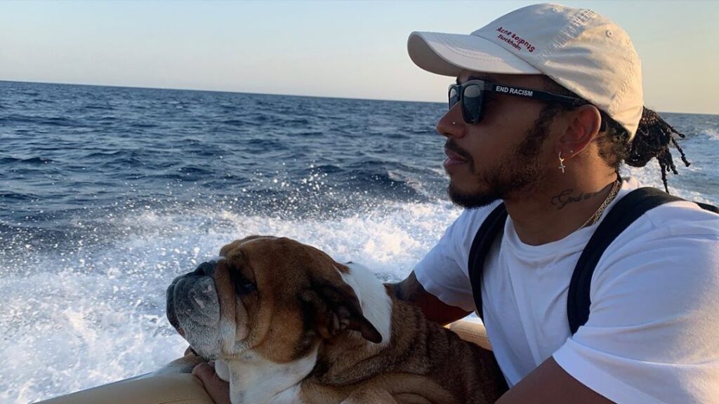 Lewis Hamilton with his vegan dog Roscoe