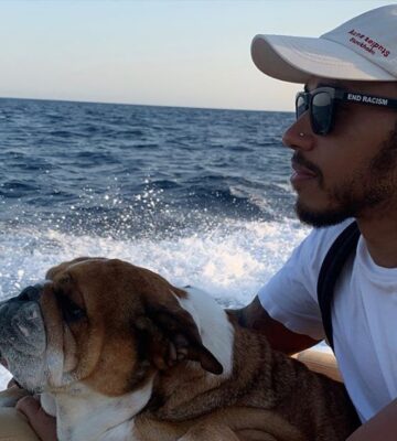 Lewis Hamilton with his vegan dog Roscoe