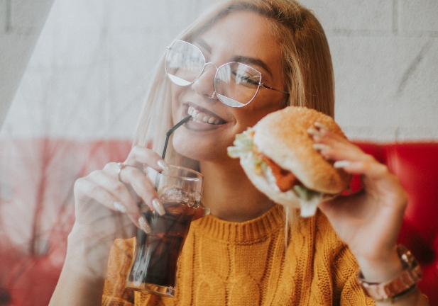 Woman eats meat-free burger