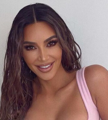 Kim Kardashian promotes a plant-based lifestyle on her Instagram, teasing an intense exercise routine for the New Year alongside.