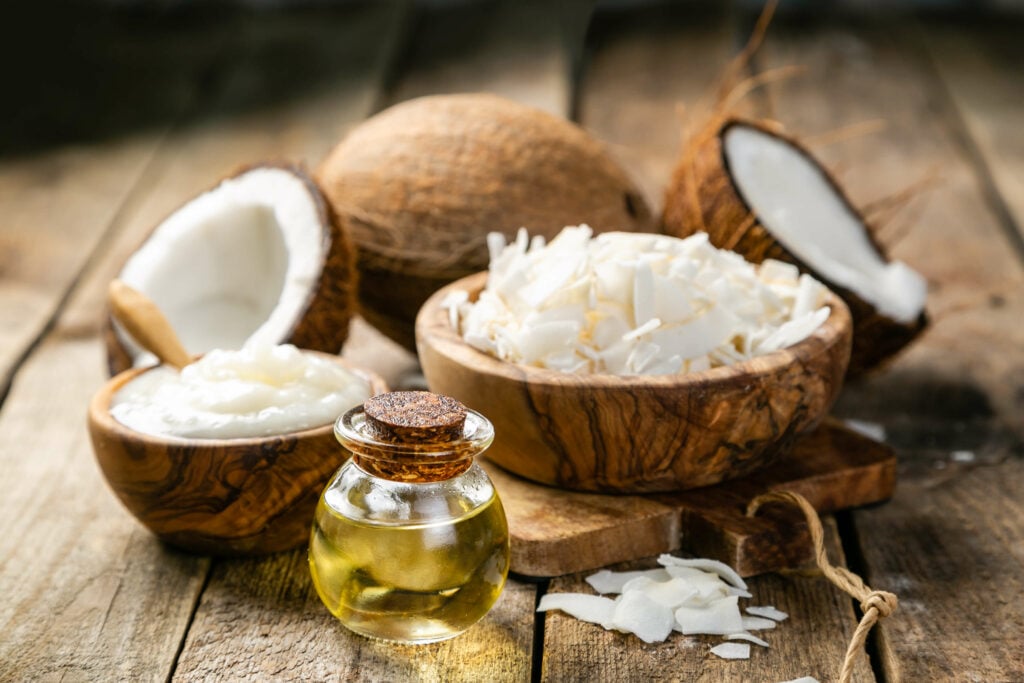 Coconut shavings, oil, and whole coconuts