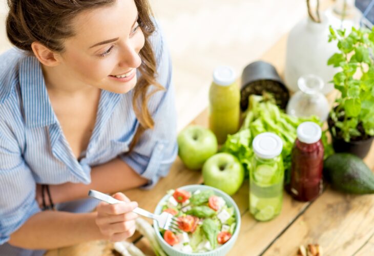 Woman Eats Healthy Vegan Bowl