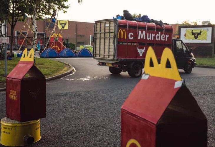 Protestors are blockading McDonald's UK burger factory, urging the chain to go plant-based