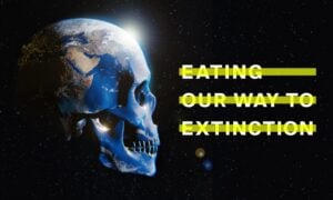 A poster for a pro-vegan climate documentary, reading "Eating Our Way to Extinction" beside a skull with the Earth inside it