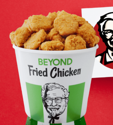 meat-free Beyond Fried Chicken pieces in green KFC bucket
