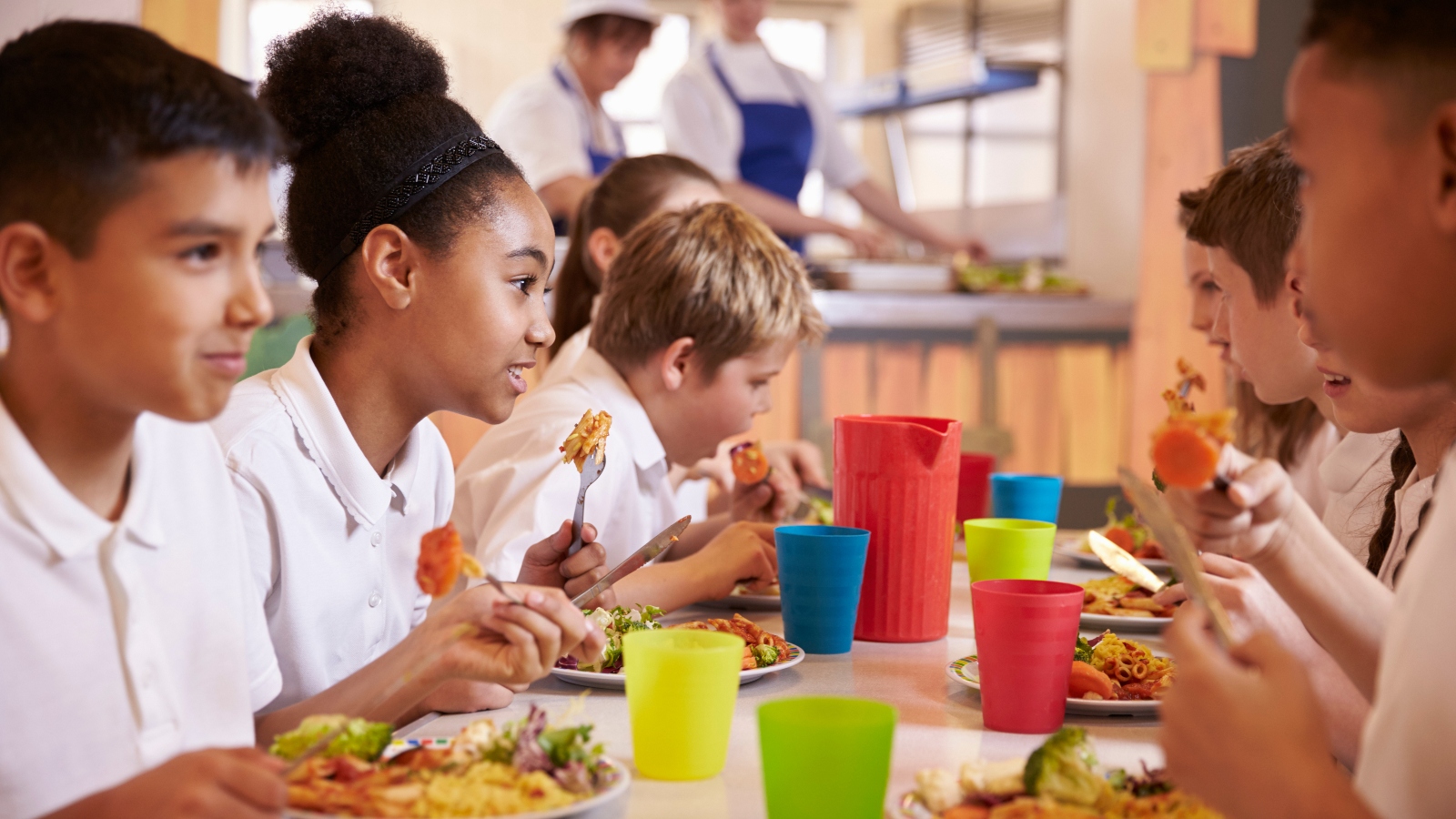 Students eat lunch in school cafeteria
