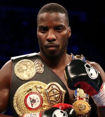 Lawrence Okolie with boxing belts