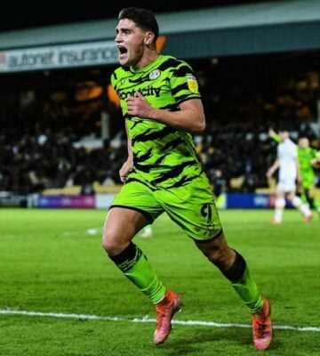Forest Green Rovers run on the football pitch