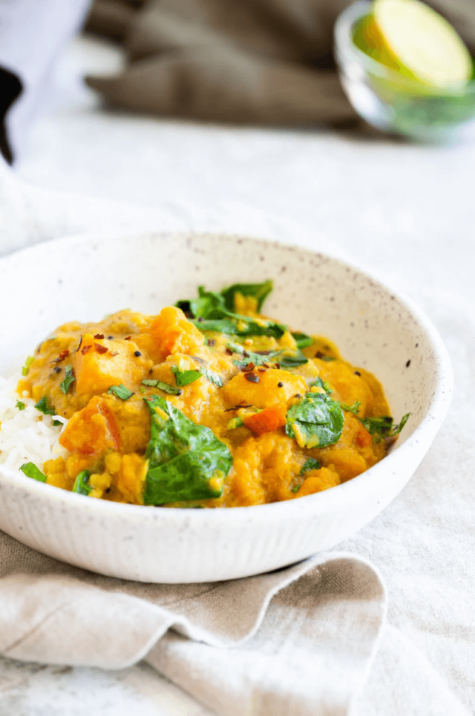 A vegan red lentil and butternut squash Indian curry made in an instant pot or saucepan