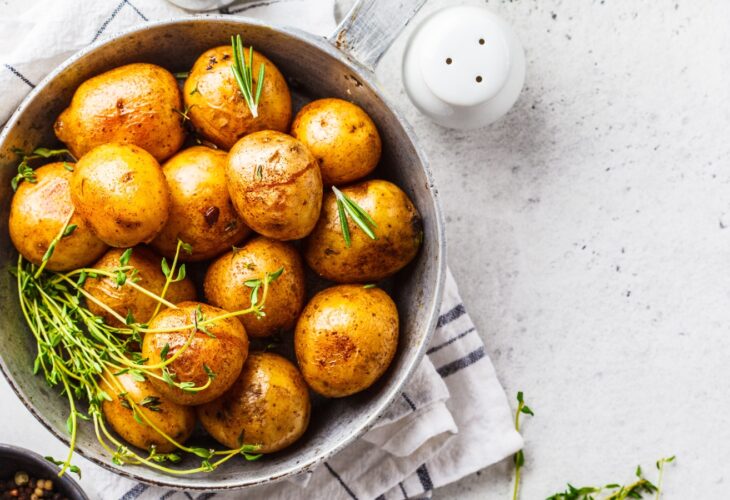 potatoes and herbs in a bowl