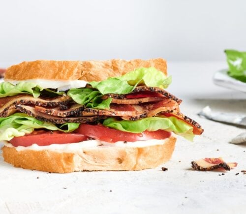 A sandwich with vegan OZO bacon