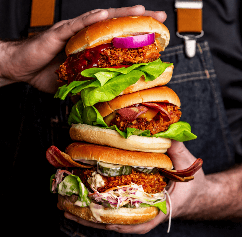 A plant-based burger featuring vegan VFC chicken