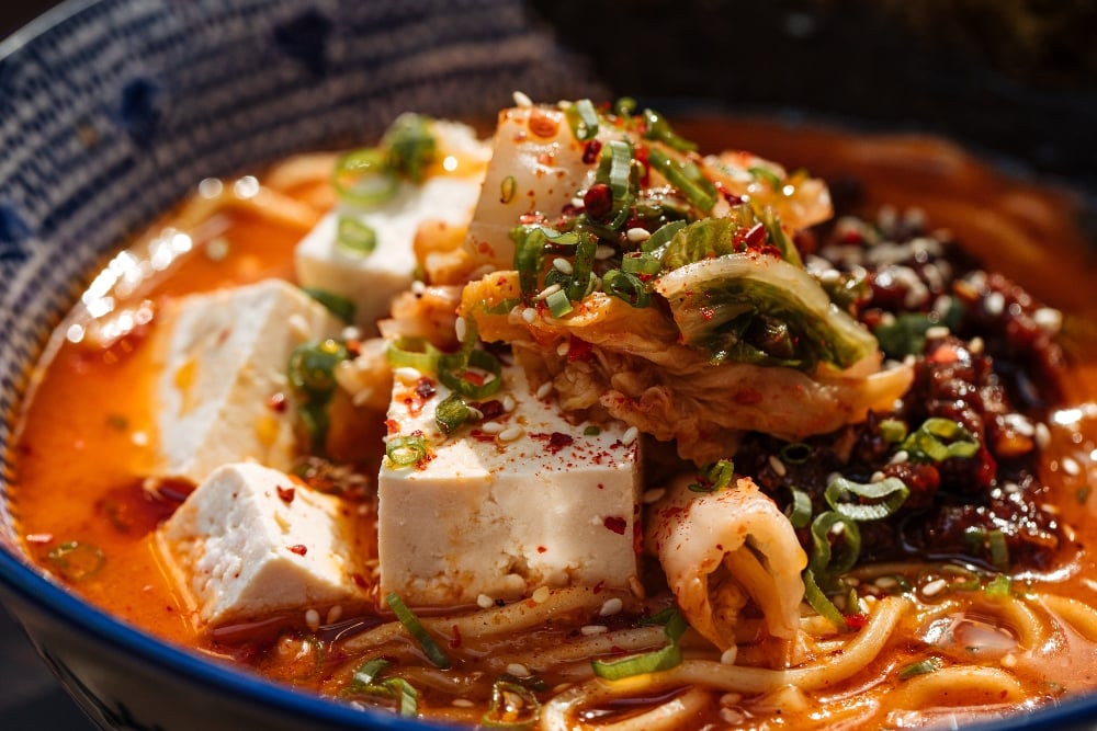 Closeup on spicy japanese miso tofu ramen with kimchi