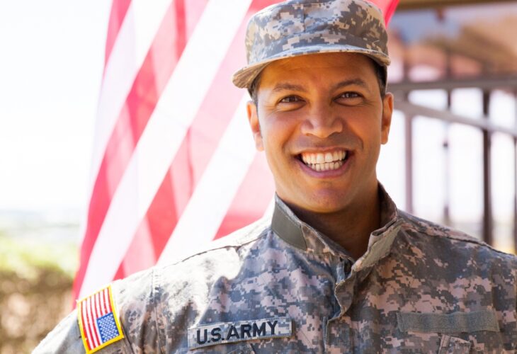 portrait of happy us army soldier outdoors