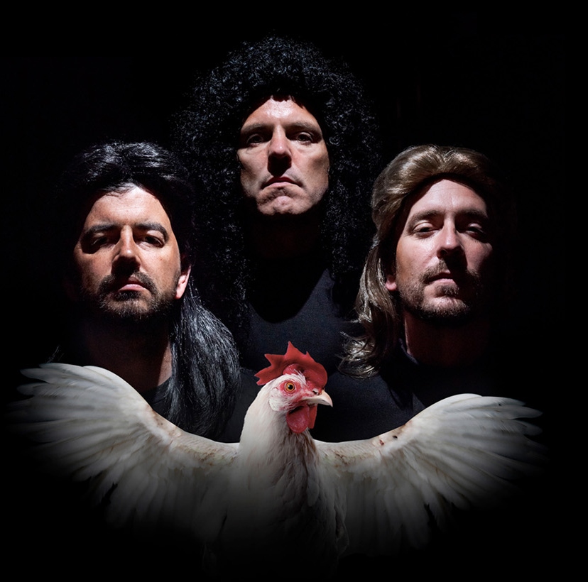 VFC team posing as the band Queen with a chicken