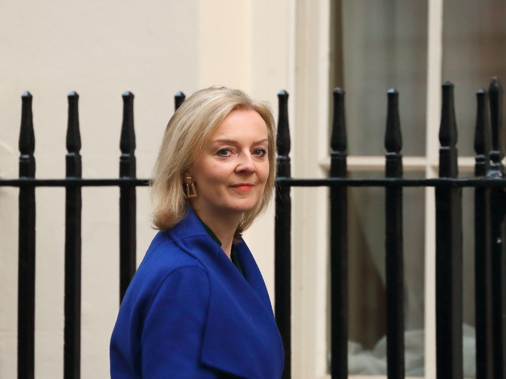 Foreign Secretary Elizabeth Truss wearing a blue suit