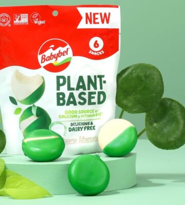 plant-based baby bels against a green background