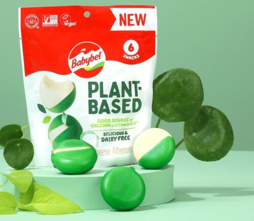 plant-based baby bels against a green background
