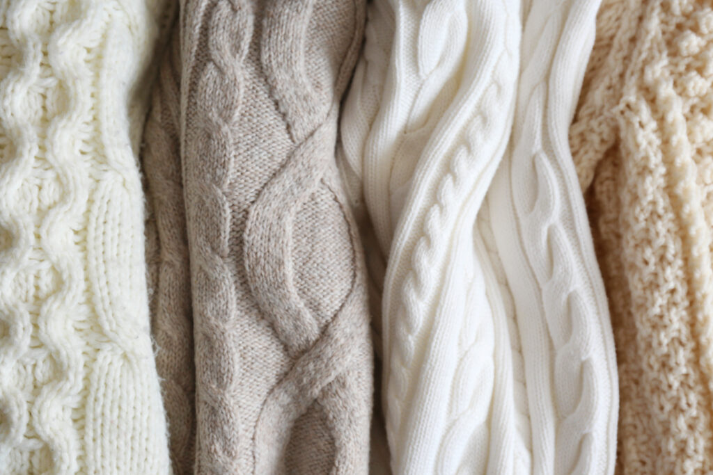 A selection of light coloured cashmere jumpers