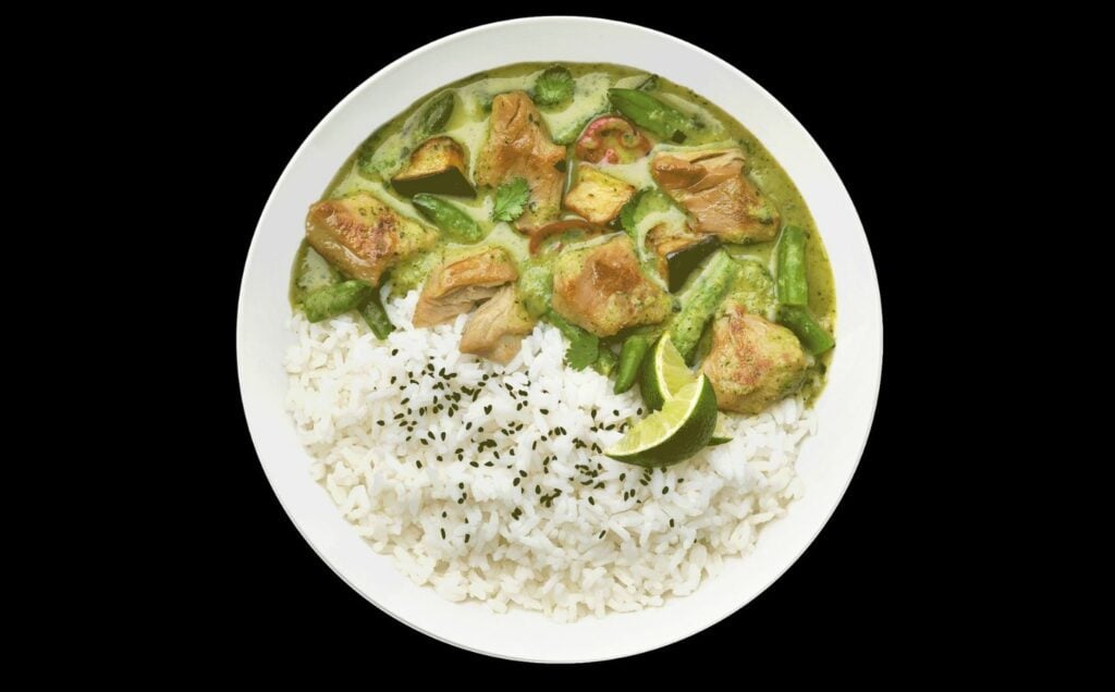 A plate of vegan THIS Isn’t Chicken Thai Green Curry