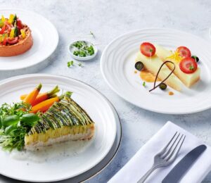 Plates of vegan and vegetarian food made by Emirates