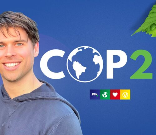 Klaus Mitchell beside the words "COP27"
