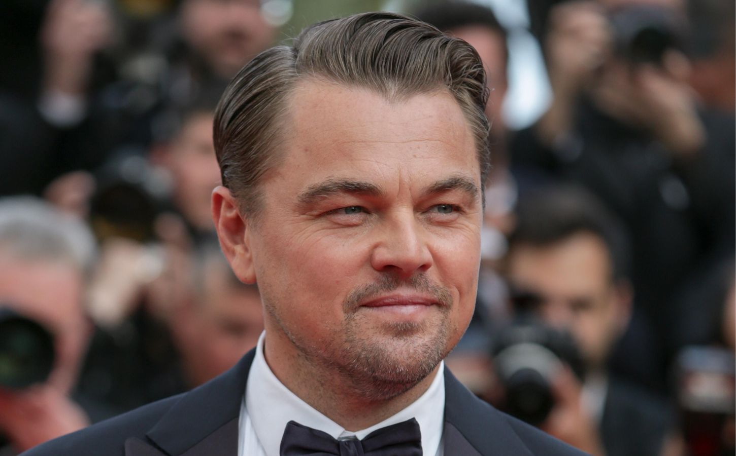 Close-up of environmentalist and actor Leonardo DiCaprio on a red carpet