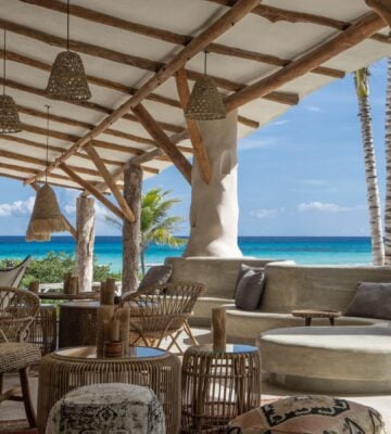 An outdoor restaurant by the beach at Palmaïa, Mexico