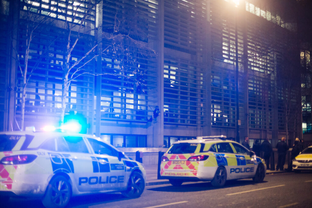 Animal activists scaling the Defra building in the early hours of this morning