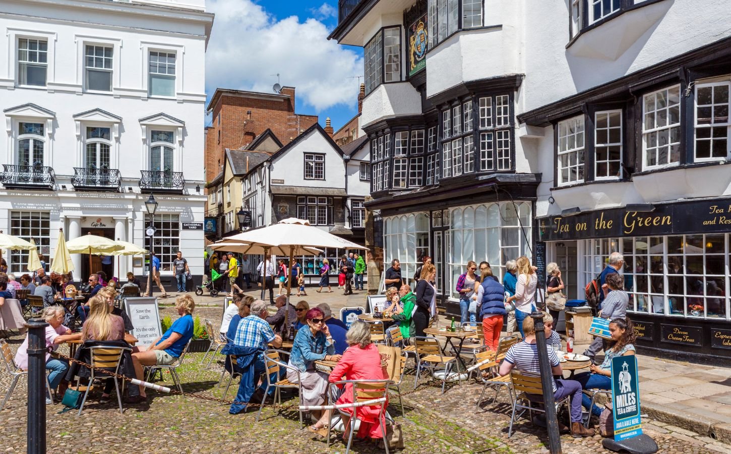 People eating outside in UK city Exeter