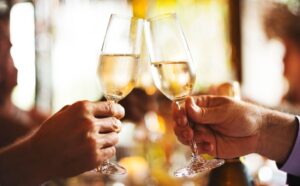 People clinking glasses of Prosecco