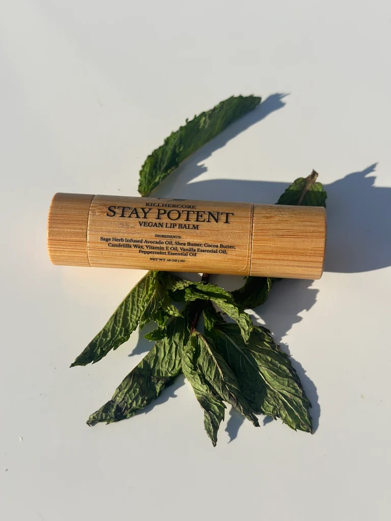 A stick of vegan Peppermint Lip Balm by killHERcore 