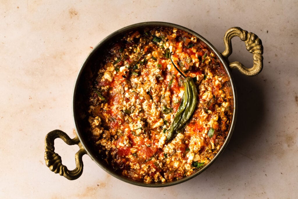 A pan of vegan shakshuka fresh from cooking