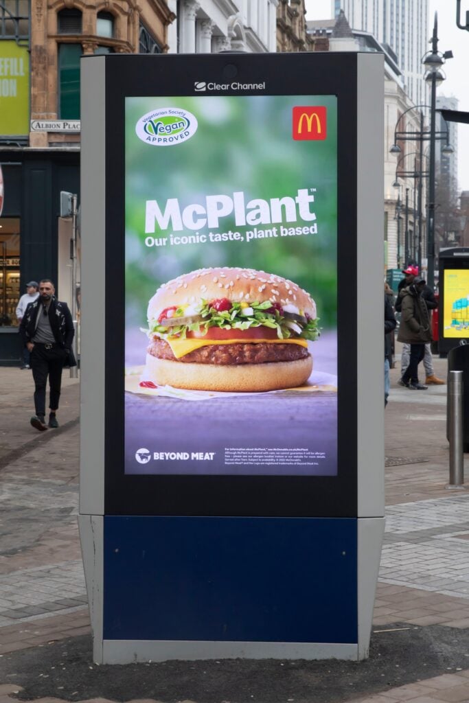 An outdoor advertisement for the McDonald's McPlant vegan burger