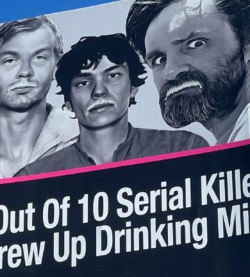 A billboard reading: "9 out of 10 serial killers grew up drinking milk"