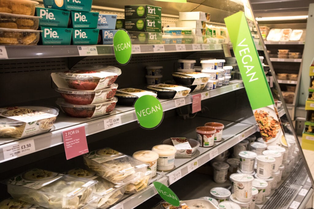 A selection of vegan, vegetarian, and plant-based food on the supermarket shelf