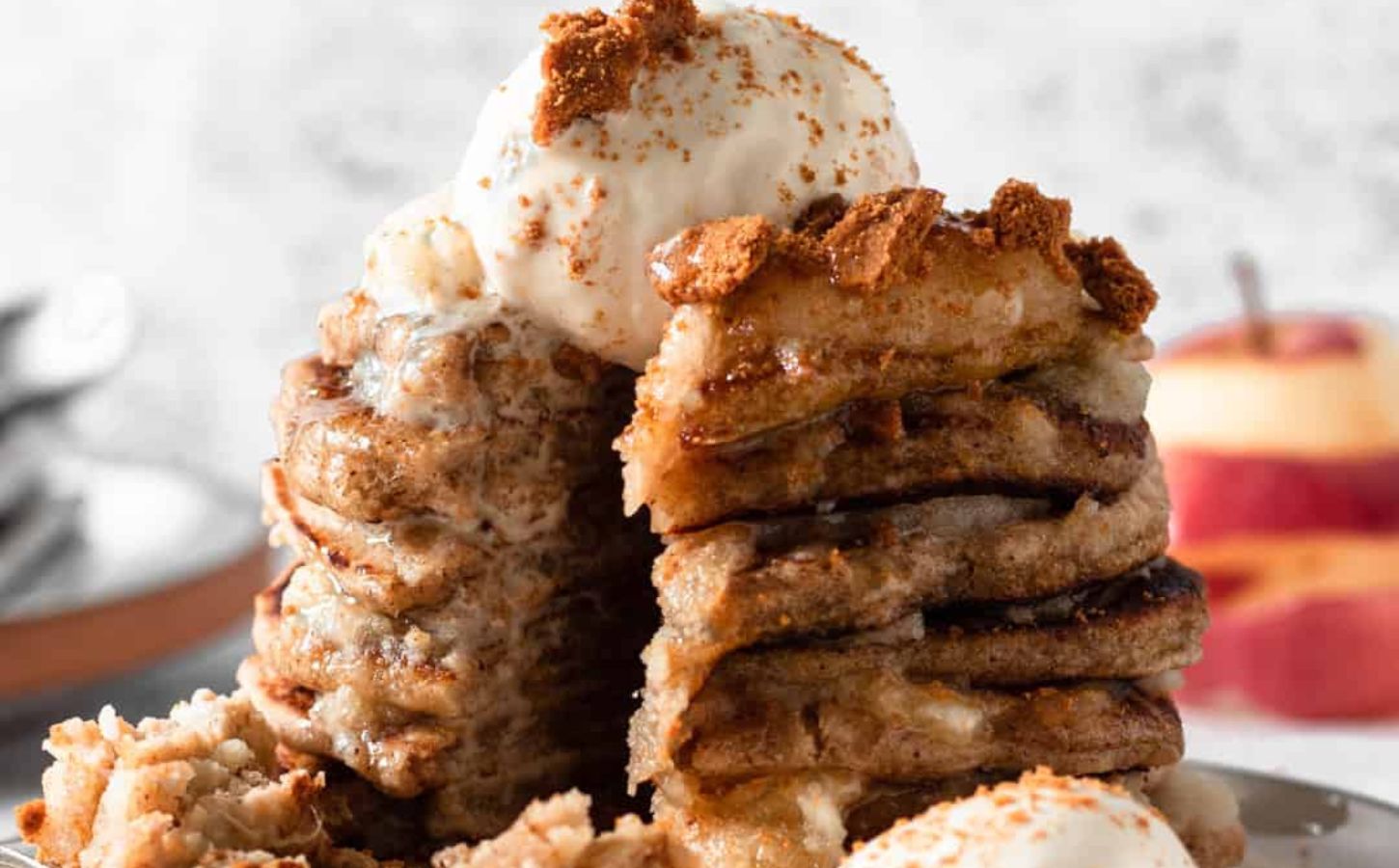Vegan apple-pie flavored pancakes with dairy-free ice cream on top