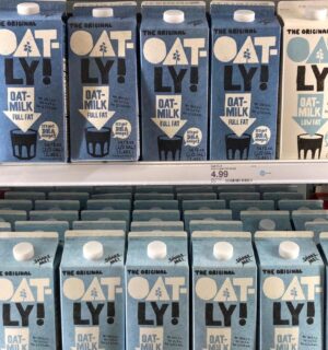 A selection of vegan Oatly oat milk drinks at a UK supermarket