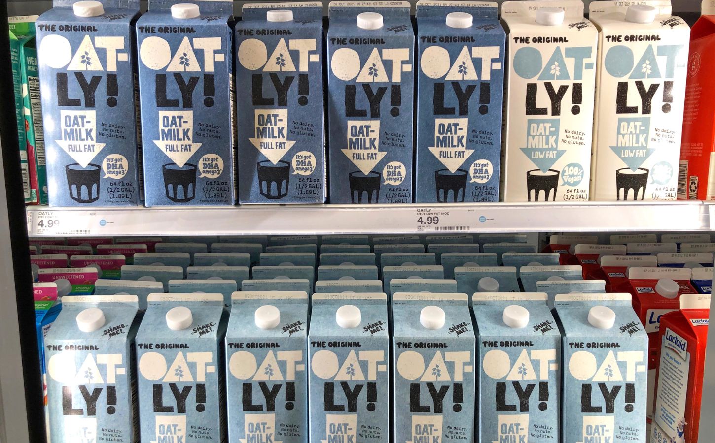 A selection of vegan Oatly oat milk drinks at a UK supermarket