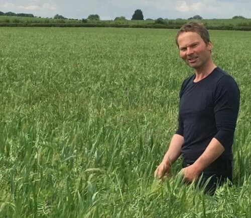Former dairy cow farmer Laurence Candy, who has turned his farm vegan, standing in a field