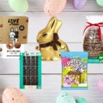 A range of vegan and dairy-free Easter chocolate and candy on a wooden plank backdrop, flanked by pastel Easter eggs