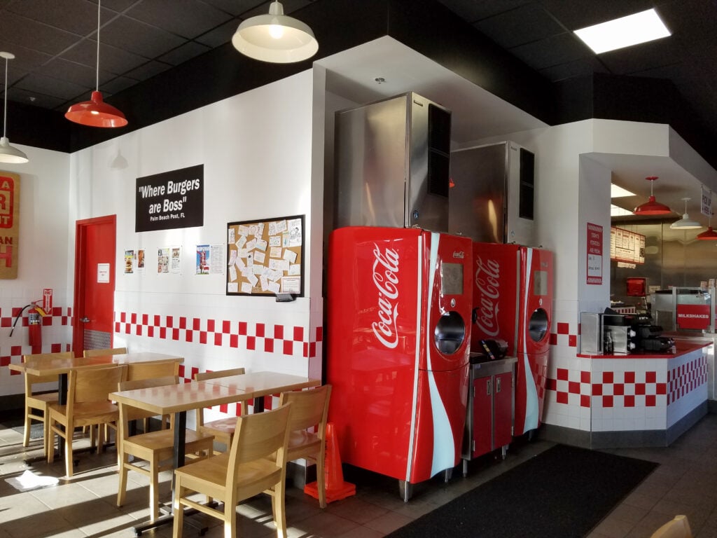 The interior of a Five Guys restaurant