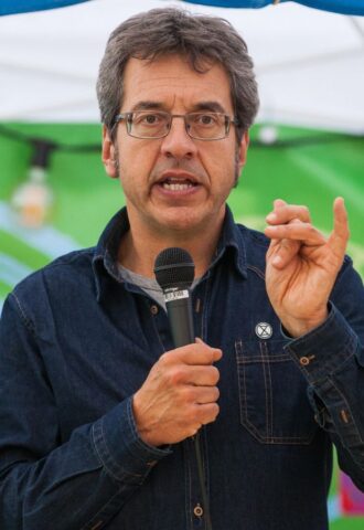 Environmental campaigner George Monbiot speaking at a festival