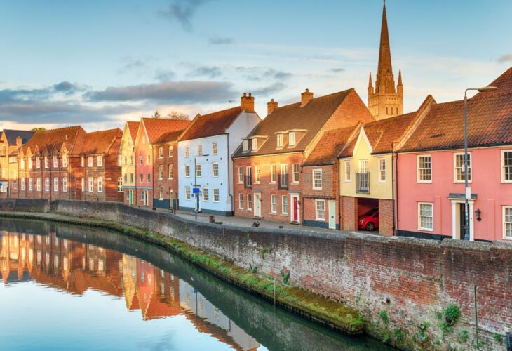 Town houses overlooking the river Yare at Norwich, which is promoting vegan food via the Plant Based Treaty