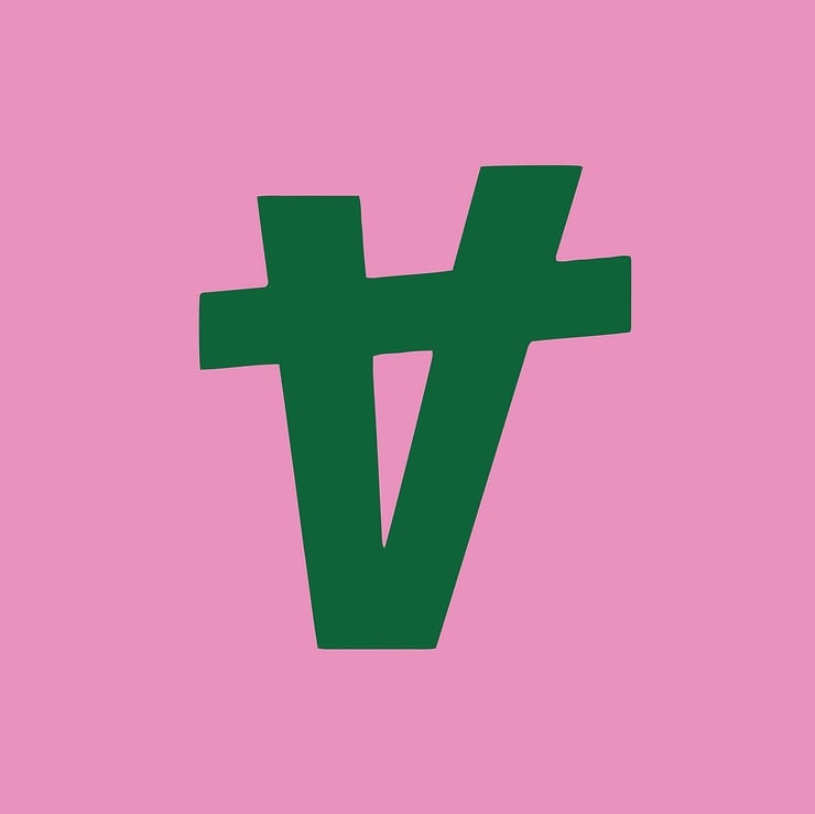 Animal Rising's new logo, a green upside down "A" in front of a pink background