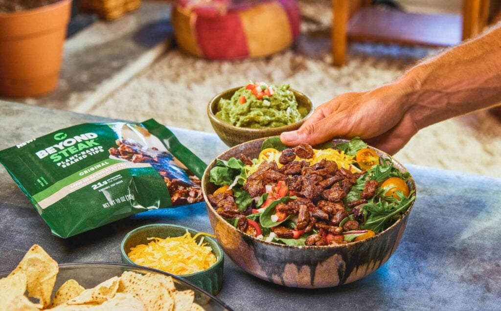 Beyond Steak used to make a burrito bowl with the green product packaging in the background