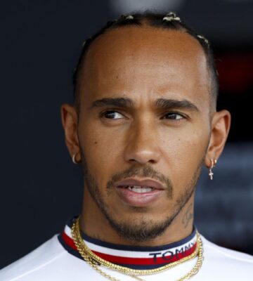 Vegan athlete and entrepreneur Lewis Hamilton looking pensive ahead of a Formula 1 race