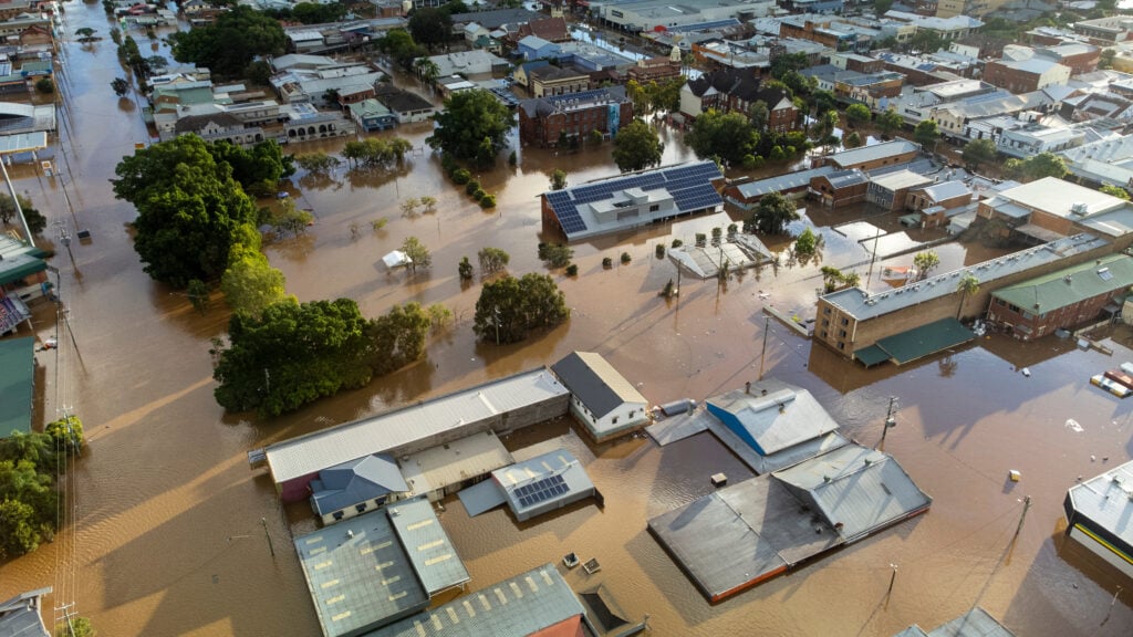 Houses caught in a flood caused by climate change