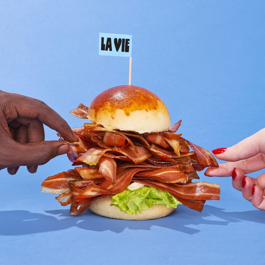 A vegan burger with La Vie bacon inside